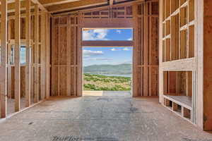 Miscellaneous room featuring a water and mountain view