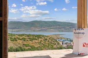 Mountain view featuring a large body of water