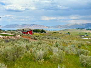 View of mountain backdrop featuring a large body of water