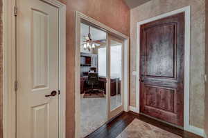Entry with Den/Office as you enter and double French doors with glass