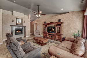 Large great room with gas fireplace shared with office