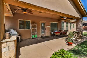 Covered patio has ceiling fans in addition to backing to the east for shady evenings
