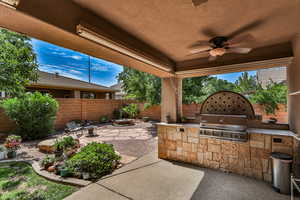 Large covered patio with built in gas grill and room to entertain