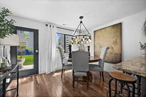 Dining area featuring and wood finished floors