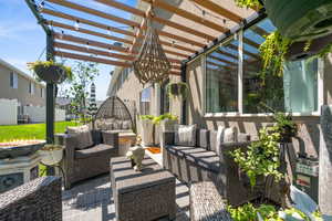 View of patio / terrace featuring an outdoor hangout area and a pergola