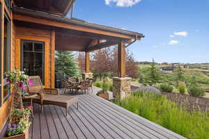 Wooden deck with outdoor dining space