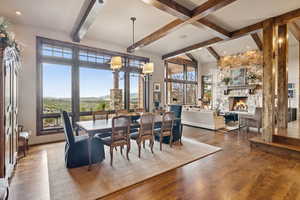 Dining space featuring healthy amount of natural light and wood finished floors