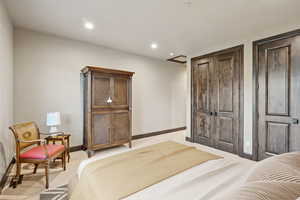 Bedroom featuring a closet and recessed lighting