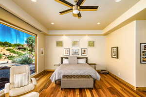 Bedroom featuring wood finished floors, recessed lighting, and a ceiling fan