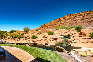 View of yard featuring a garden pond