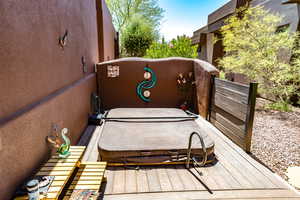 Deck with a covered hot tub