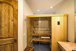 Relaxing sauna featuring recessed lighting