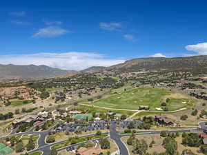 Aerial view of property's location featuring nearby suburban area