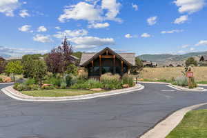 View of side of home featuring a mountain view