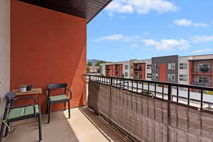 Balcony featuring a residential view