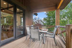 Wooden deck with outdoor dining space