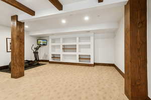 Exercise room with recessed lighting and carpet flooring