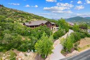 View of subject property with a mountainous background