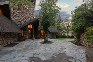 Patio terrace at dusk featuring a patio