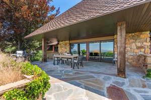View of patio / terrace featuring outdoor dining area and area for grilling