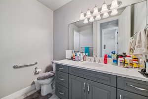Bathroom featuring vanity and tile patterned flooring