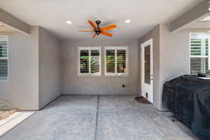 View of patio featuring a ceiling fan and area for grilling
