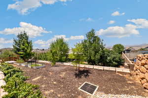 View of yard with a garden