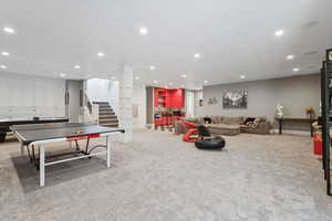 Recreation room featuring recessed lighting and carpet floors