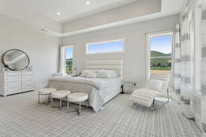 Carpeted bedroom with recessed lighting