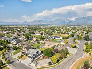 Aerial view of residential area with a mountainous background