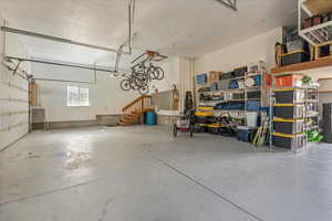 Garage featuring a garage door opener