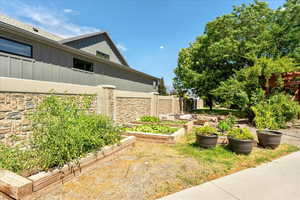 View of yard with a garden
