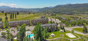 Aerial view of a mountainous background and a pool