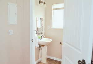 Bathroom with stone finish flooring