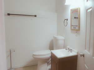 Bathroom featuring toilet and vanity