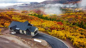 View from above of property featuring a mountainous background