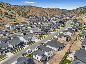 Aerial view of residential area with a mountainous background