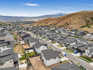 Aerial perspective of suburban area featuring mountains