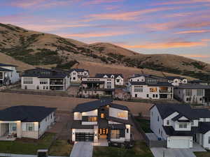 Mountain view featuring nearby suburban area