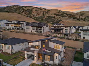 Aerial view of residential area with a mountain backdrop