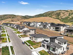 Aerial perspective of suburban area with mountains