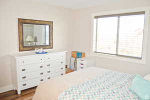 2 nd Bedroom with dark wood-style flooring and baseboards