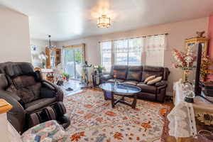 Living area featuring a chandelier
