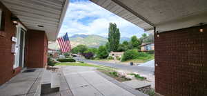 View of patio with a mountain view