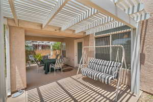 View of patio / terrace with a pergola and outdoor dining area