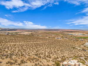 Overview of rural landscape with mountains and a desert landscape. Looking southwest