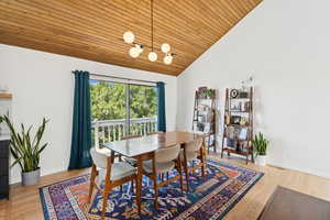 Dining space walks out to deck with stunning valley views