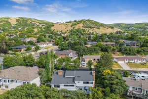 Aerial view of residential area with a mountainous background