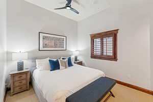Bedroom with baseboards and ceiling fan