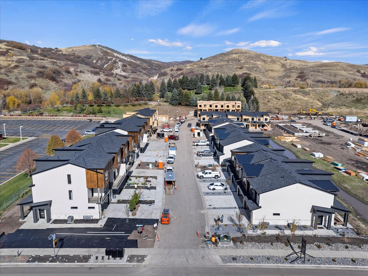 Aerial view of residential area with mountains